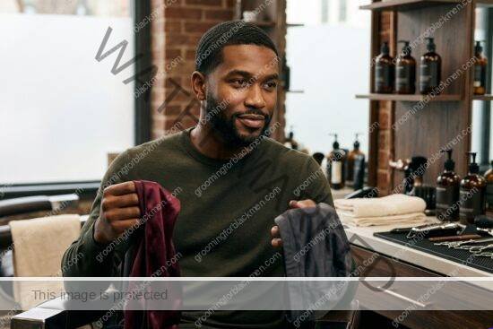 Black man grooming routine image for Durag vs Wave Cap for Black Men: Practical Grooming Guide