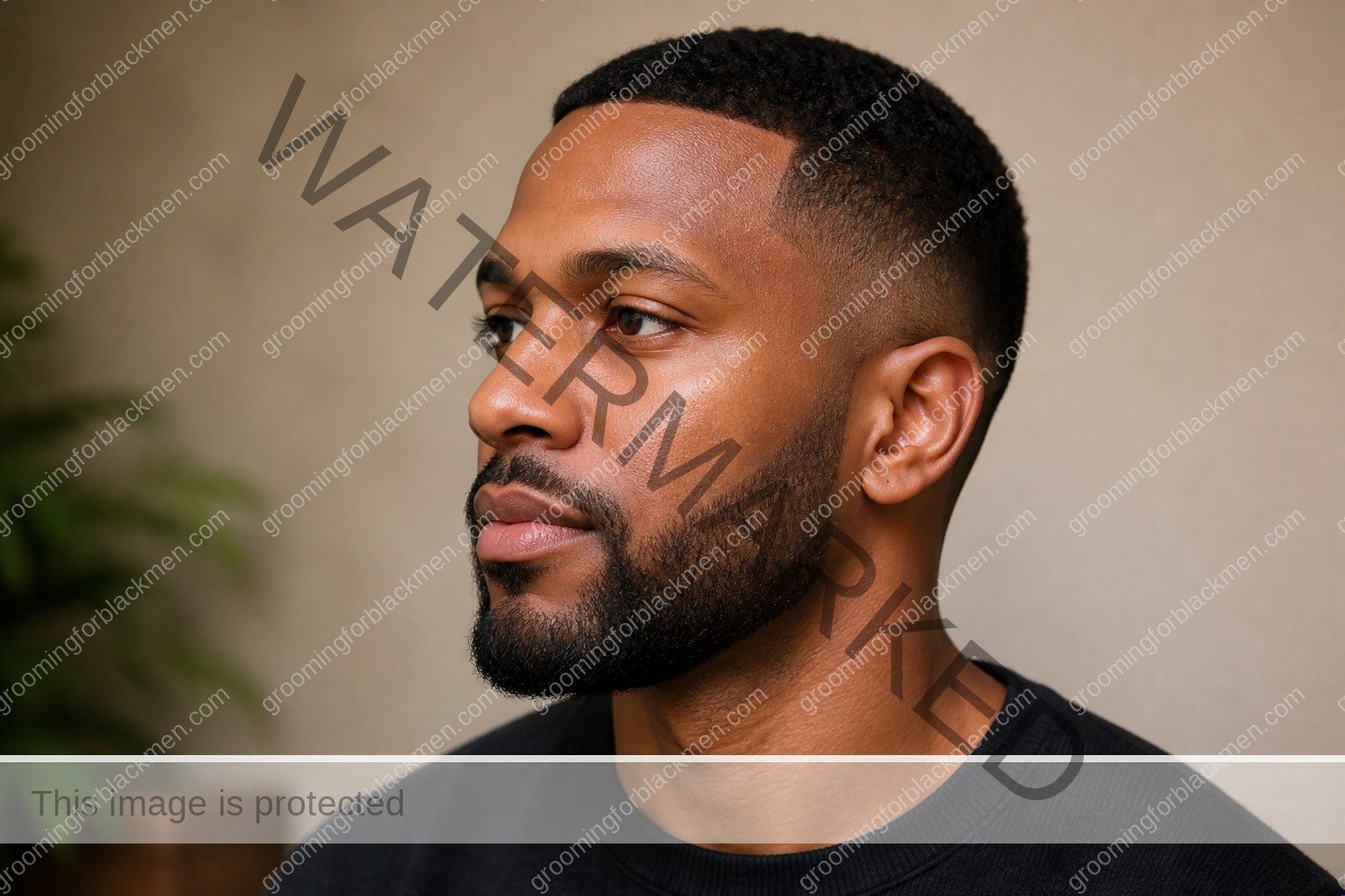 Black man assessing tinted moisturizer for Black men dark skin with natural rich brown skin texture visible