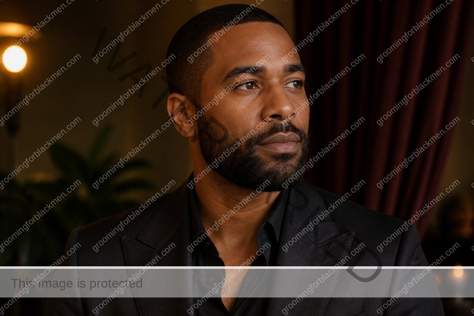 Black man completing a calm routine for tinted moisturizer for Black men dark skin with realistic skin texture