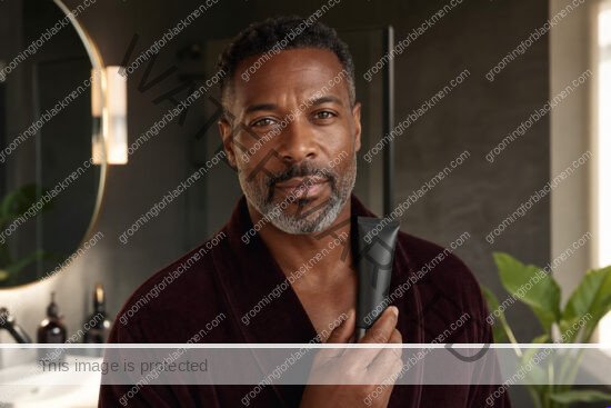 Black man in a premium editorial setting for skincare routine Black men 40s aging