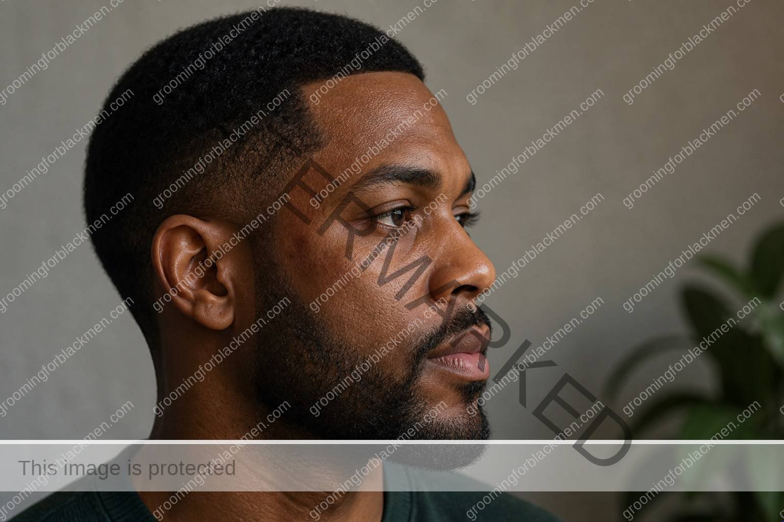 Black man assessing skincare ingredients to avoid Black men irritation with natural rich brown skin texture visible